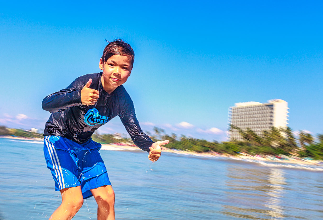 the surfer child surfing lesson